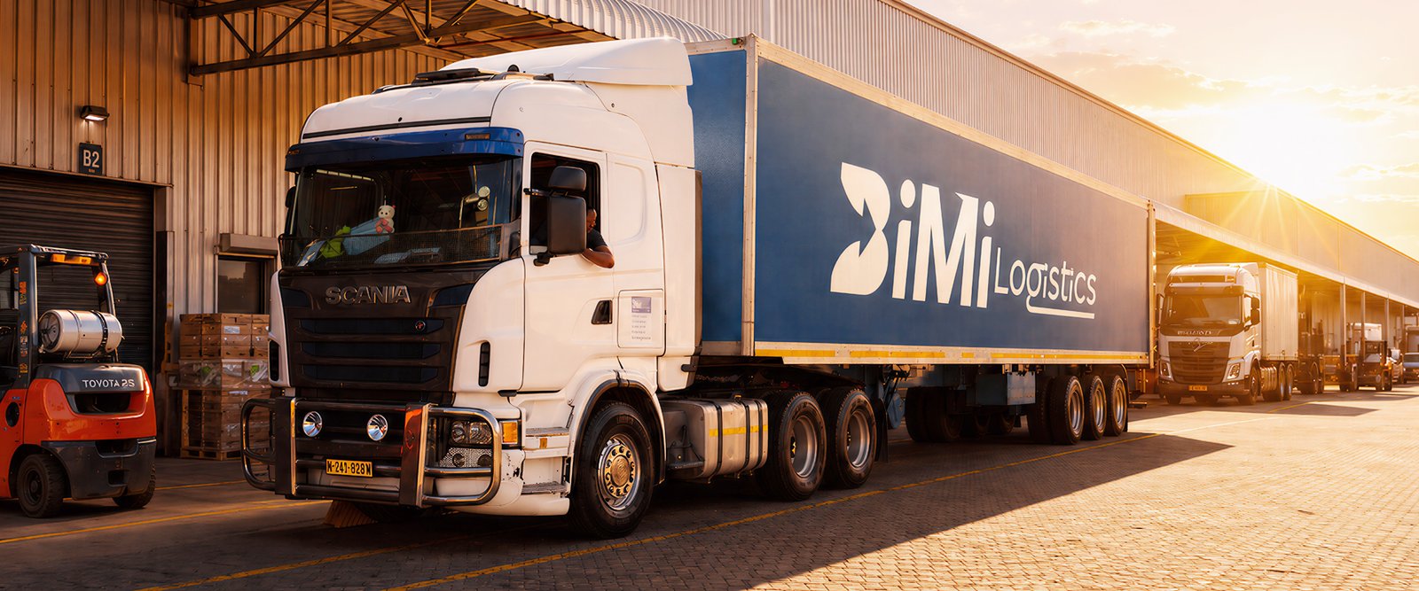 Bimi Logistics Truck Loading - Adzooka Website Design